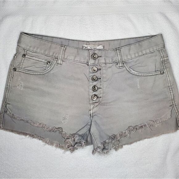 Free People Rugged Ripped Denim Shark Bite Shorts - Picture 3 of 13